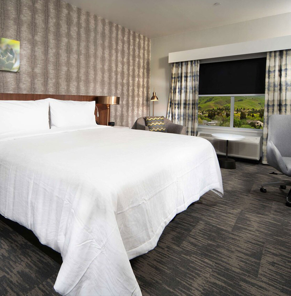 inside view of Hilton Garden Inn Fremont Milpitas hotel bedroom