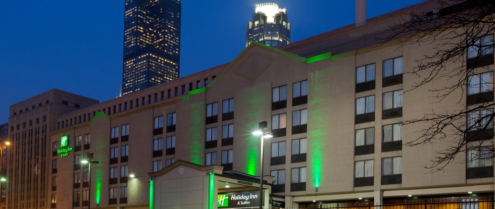 holiday Inn lit up with green lights