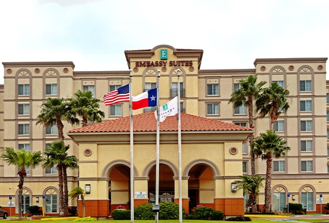 exterior view of Embassy Suites Laredo Acquired